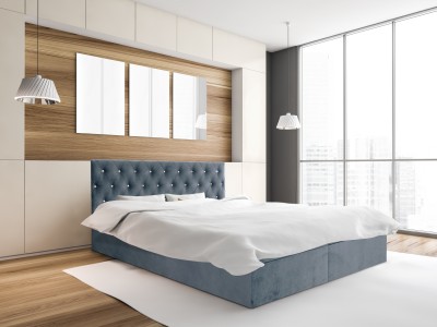 Mockup canvas three posters above bed with pillows, carpet and parquet floor, side view. Wooden bedroom with city view, 3D rendering no people